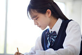 japanese-female-high-school-student-taking-classes-in-a-high-school-classroom.jpg?b=1&s=170x170&k=20&c=TL9nzJlvPLL1tRpvCIDcoQ9QuTe35A8llgSrXrP7eJM=