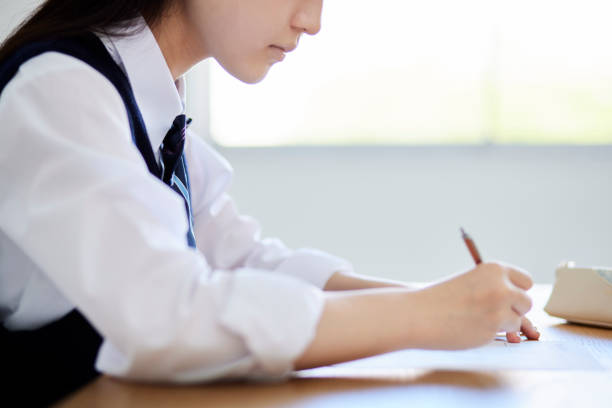 Japanese female high school student taking classes in a high school classroom