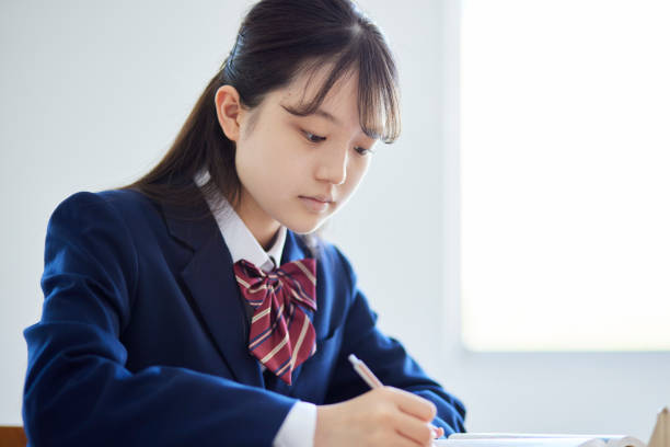 istock Japanese female high school student taking classes in a high school classroom 2153814273