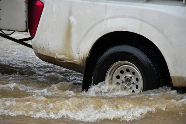 istock Flood water with car 2153815447