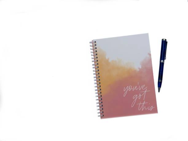 istock Top view Top of Blue Pen alongside a Notepad with motivational words on a white background with copy space 2153816137