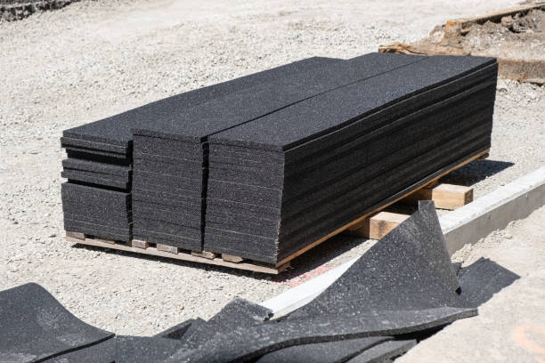 istock Rubberized road surface for sound insulation in tramway track repair is laid out on an industrial pallet, ready for installation. Modern building materials. 2153816507