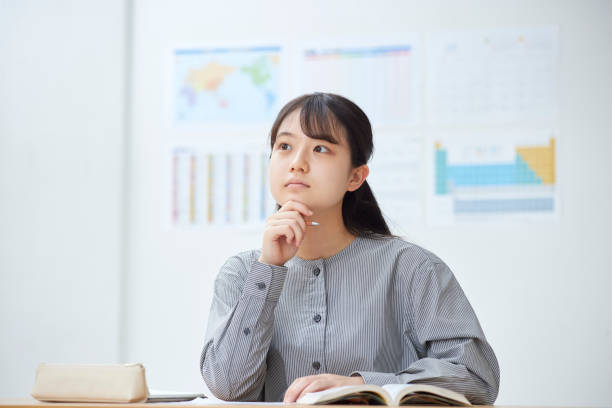 istock High school girls taking classes at a prep school 2153817934