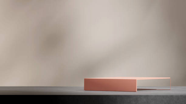 istock peach color table podium in landscape concrete floor and beige wall, 3d rendering scene template 2153819739