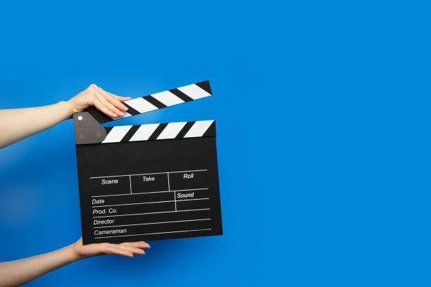 istock Hands with movie board, clap action, cinematography scene, studio. 2153820239