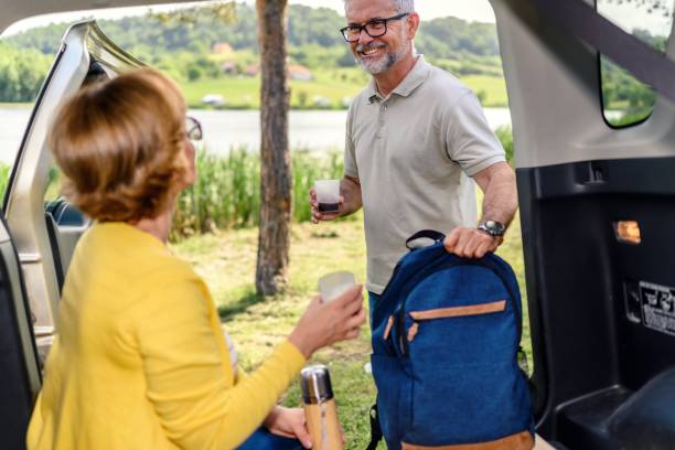 istock Mature couple is relaxing by the lake 2153820570