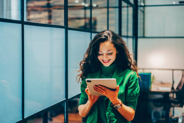 istock Businesswoman using digital tablet in the office 2153820756