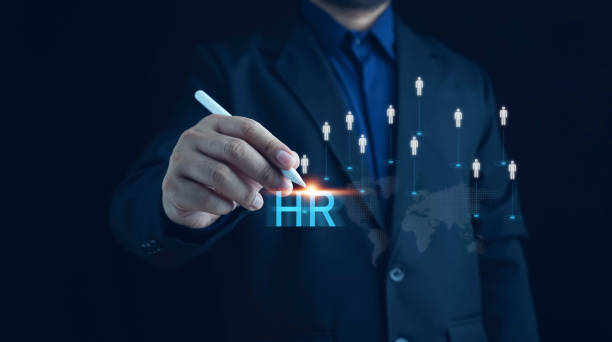 istock HR management, Human resources management concept, Technology and network concept. CRM, HR word button. Businessman presses hr icon on virtual screen on background of network business success sign. 2153822586