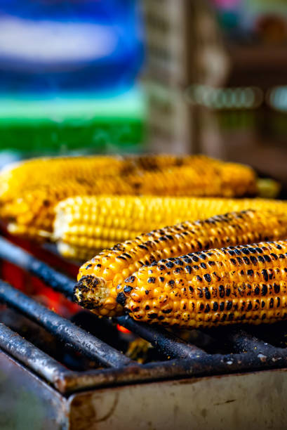 istock Corn is fried on a grill. Street food. 2153828165