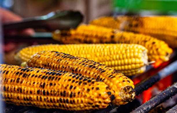 istock Corn is fried on a grill. Street food. 2153828183
