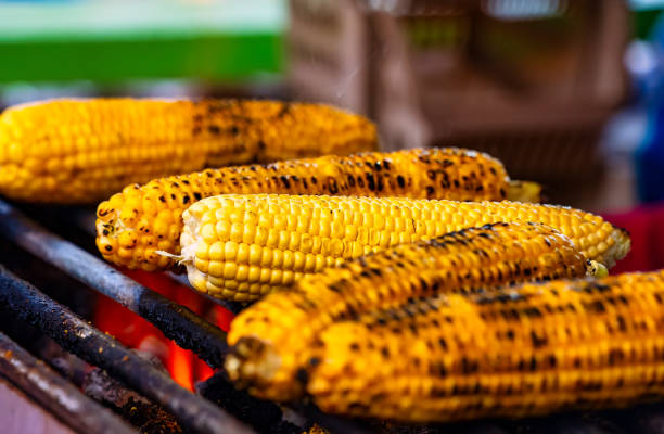 istock Corn is fried on a grill. Street food. 2153828227
