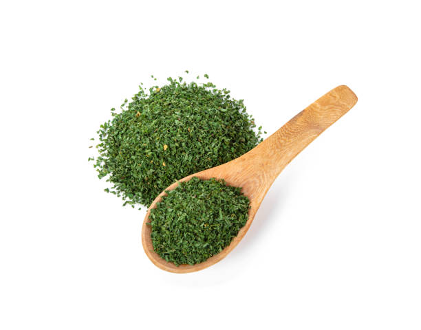 istock Dried parsley isolated on white background 2153833570