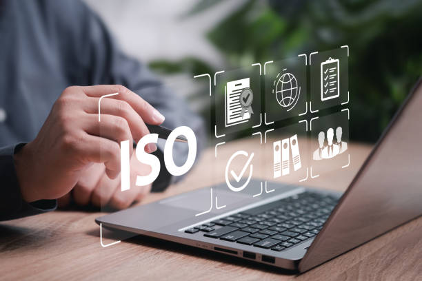 istock ISO standard, Certification, standardization process, Businessman use laptop show Standards of the work process product, Quality personnel , Best certificate document, Internationally accepted 2153834178