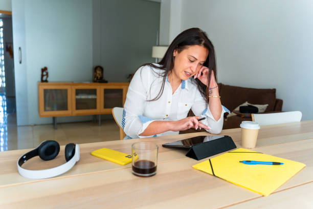 istock Middle aged Romanian businesswoman using a tablet to telework 2153834973
