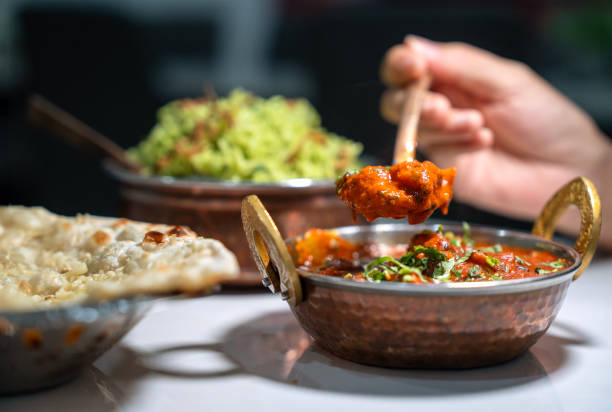 Indian Butter Chicken Curry served together with garlic naan and basmati rice. Indian Butter Chicken Curry served together with garlic naan and basmati rice. Butter Chicken stock pictures, royalty-free photos & images