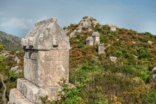 istock Ancient old ruined tombs on sunny day against sky in Turkey 2153839938