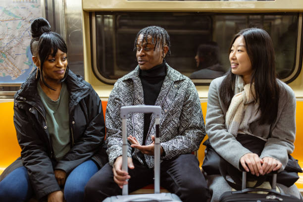 istock Diverse Group of Students Riding NY Subway 2153840626