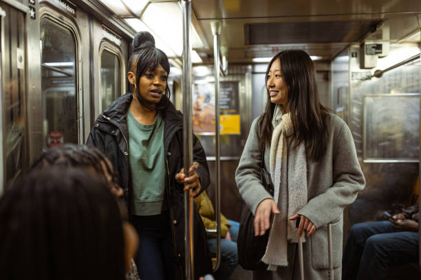 istock Diverse Students Chatting on New York City Subway 2153840677