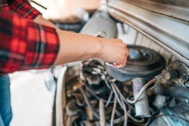 young woman mechanical  repair car