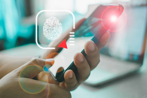 istock Hand holding smartphone and scan fingerprint biometric identity for unlock mobile phone 2153842009