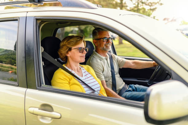 istock Happy couple enjoying while traveling by SUV 2153842305