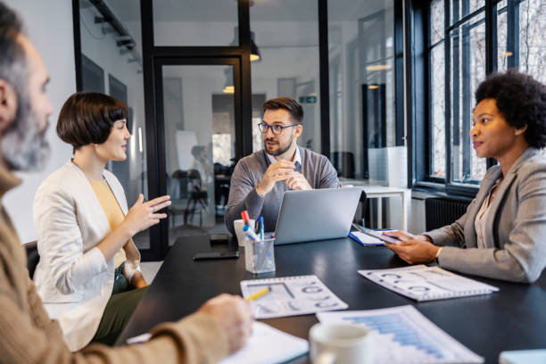 istock A multicultural team is sitting at boardroom and brainstorming. 2153845194