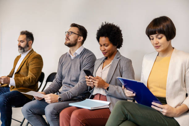 istock Interracial potential employees waiting for job interview. 2153845383