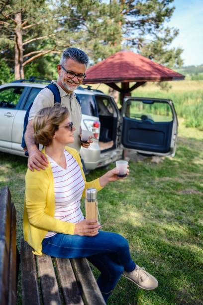 istock Mature couple is relaxing by the lake 2153845504