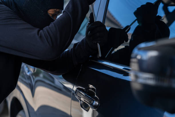 istock Thieves are stealing cars 2153846604