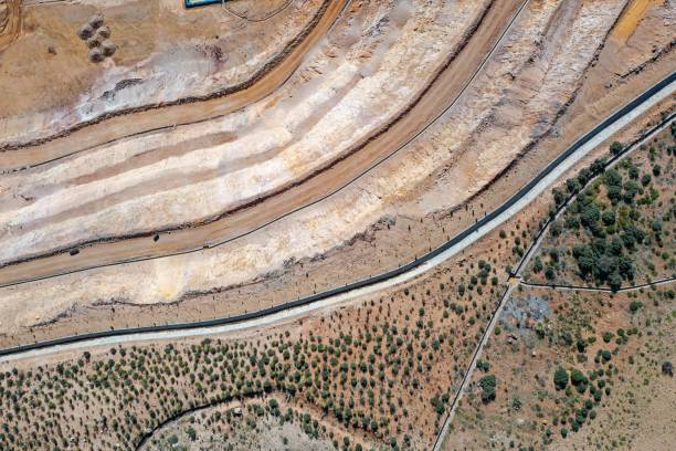 istock AERIAL VIEW OF OPEN PIT MINE WITH ENVIRONMENTAL REMEDIATION 2153847541