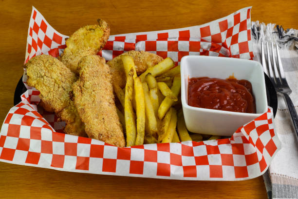 istock chicken fingers with a side of fries 2153848169