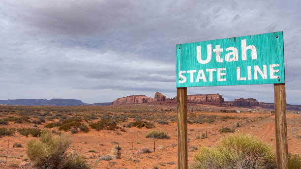 istock Rustic Utah State Line Sign in Monument Valley 2153850076
