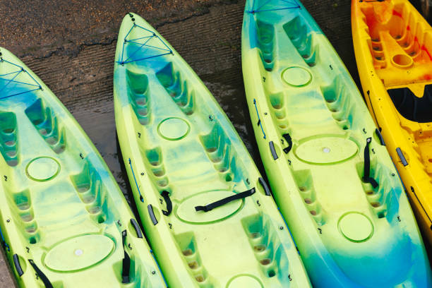 istock Colorful Kayaks Arranged Neatly on The Dock, Ready for Launch 2153855280
