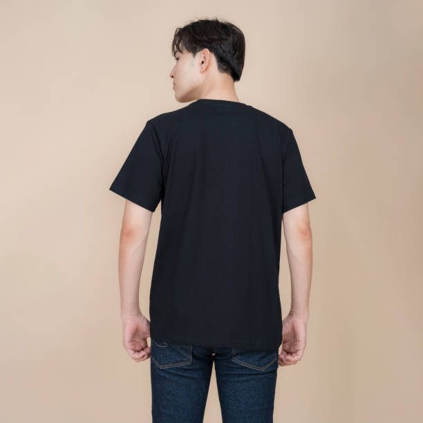 istock Young man posing in casual black t-shirt 2153857600