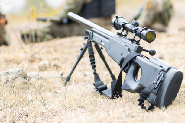 Black sniper rifle with telescopic sight airsoft ground mount with bipod