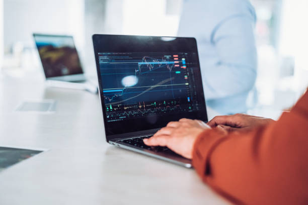 istock Woman using financial technologies in the office. 2153864755