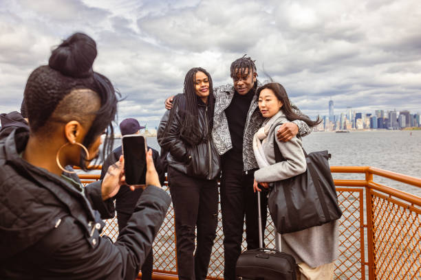 istock Friends Pose for a Photo on Staten Island Ferry 2153866983