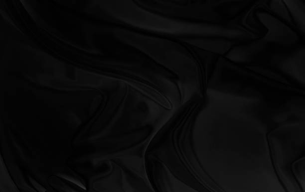 Black gray satin dark fabric texture luxurious shiny that is abstract silk cloth background with patterns soft waves blur beautiful.