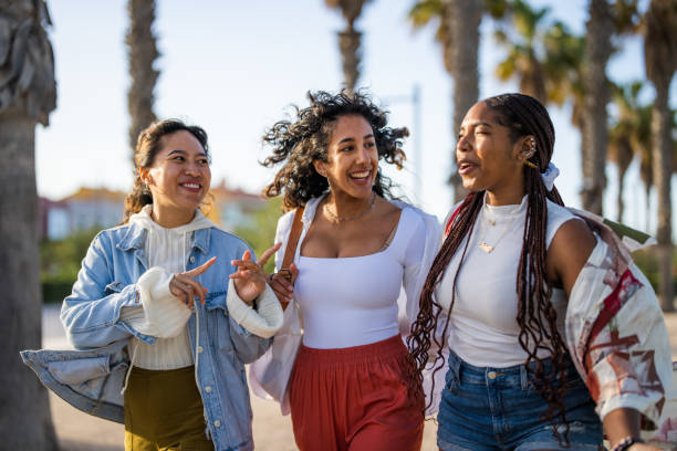 istock Joyful Diverse Friends Bonding in Sunlit Park 2153868685