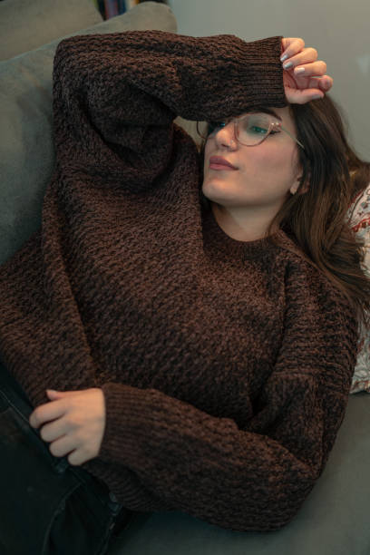 istock Thoughtful Moment on the Couch 2153868859