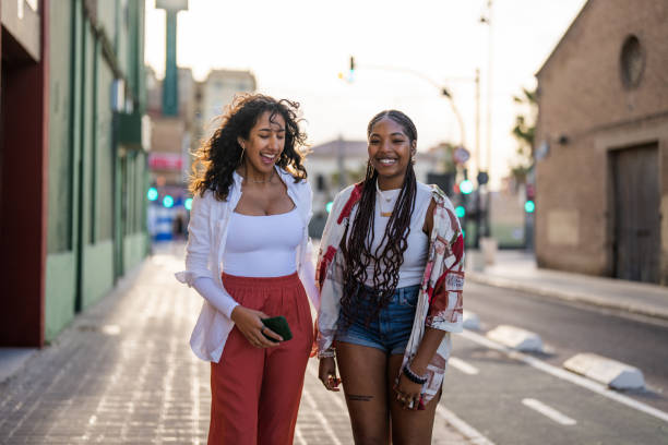 istock Diverse Friends Sharing Happiness with a Smartphone Outdoors 2153868864