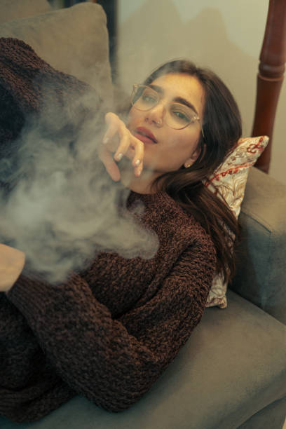 istock Young Woman Vaping Indoors 2153868895