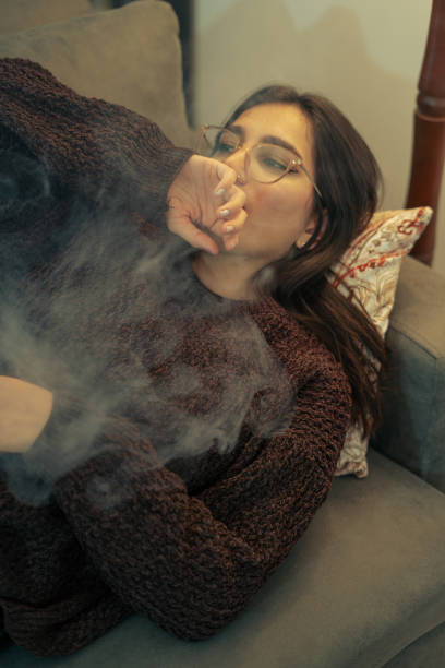 istock Young Woman Vaping Indoors 2153868899