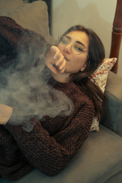 istock Young Woman Vaping Indoors 2153868905