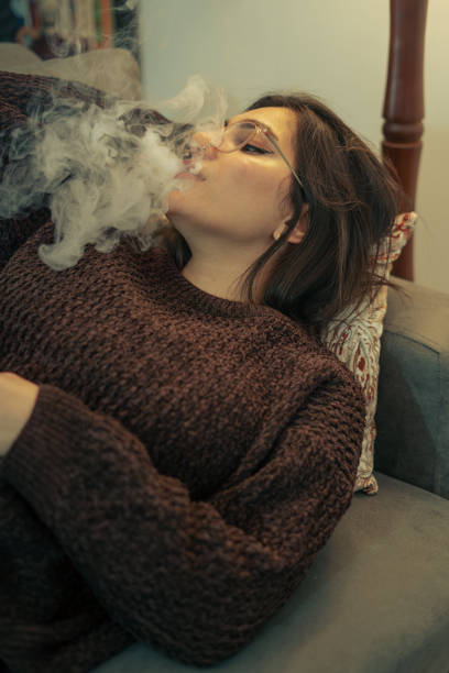 istock Young Woman Vaping Indoors 2153868917
