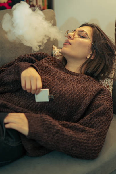 istock Young Woman Vaping Indoors 2153868938