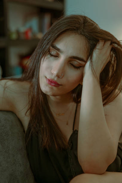 istock Serene Woman Resting Indoors 2153870341