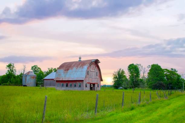 istock Old Weathered Red Barn at sunrise- Howard County, Indiana 2153871761