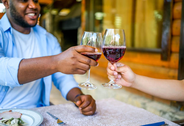 istock Couple making a toast during lunch in the backyard 2153875366