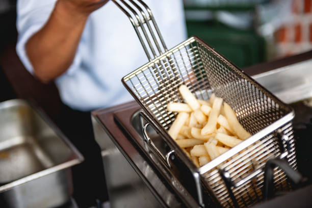 istock Chef preparing french fries 2153882146